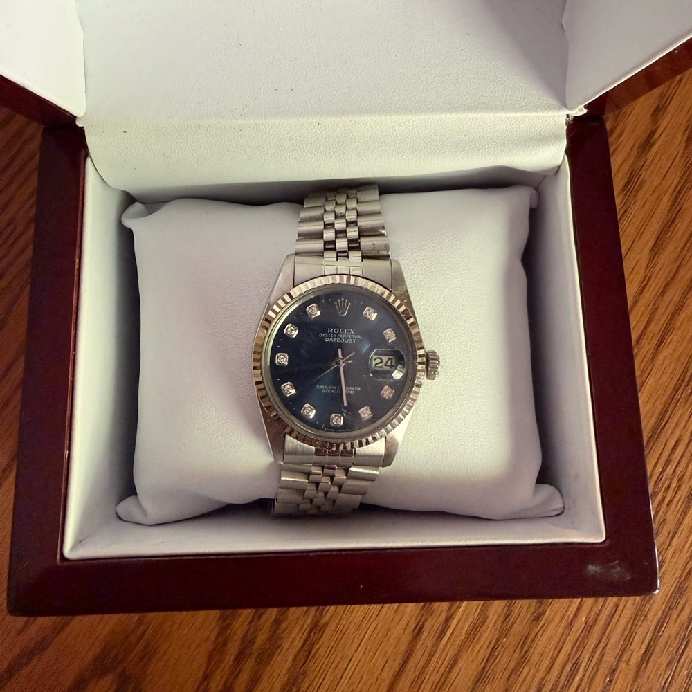 Rolex Silver Stainless Steel Watch with Black Dial and Diamond Markers